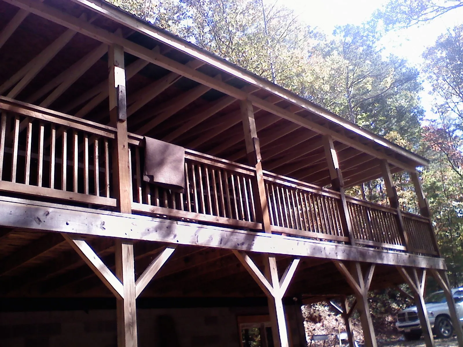 Timber framing under a new elevated porch and deck — Roof Leak Repair in Moyie Springs by Roofing Brothers